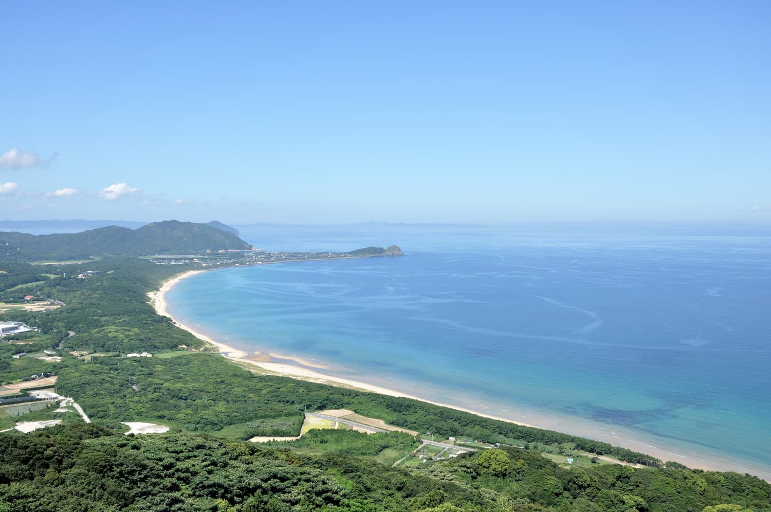 A long white beach on the Nogita coast of Itoshima seen from the hills