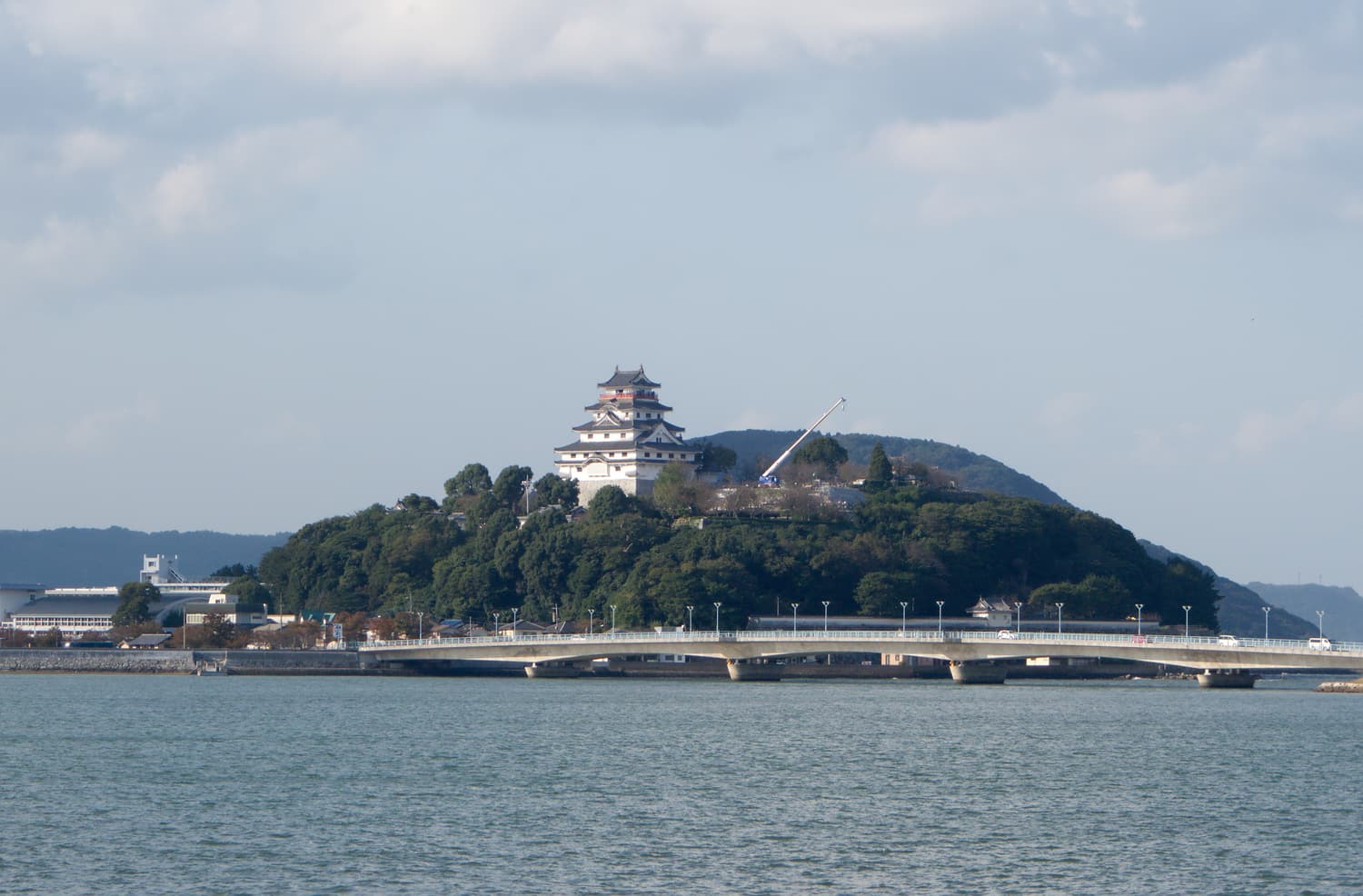 Karatsu Castle standing on a wooded hill above the sea